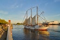 The tall ship GroÃÅ¸herzogin Elisabeth docks at the pier in Vegesack during the golden hour